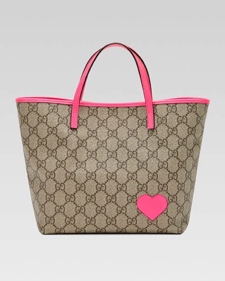 pink gucci bag with heart